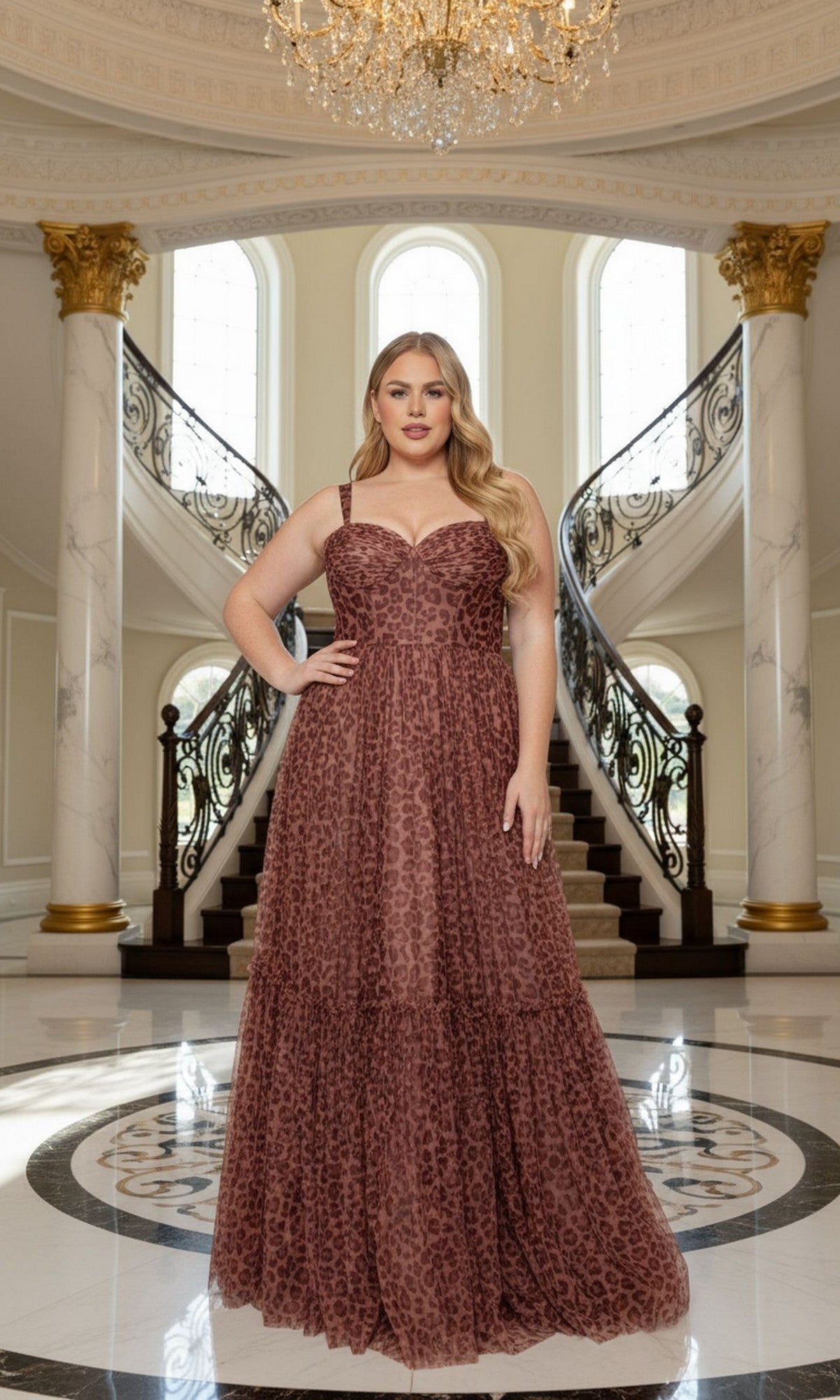 Wearing the Long Plus-Size Prom Dress Poly USA W1226 in black/brown, a woman stands in a grand foyer with marble floors, a chandelier, and a double staircase in the background.